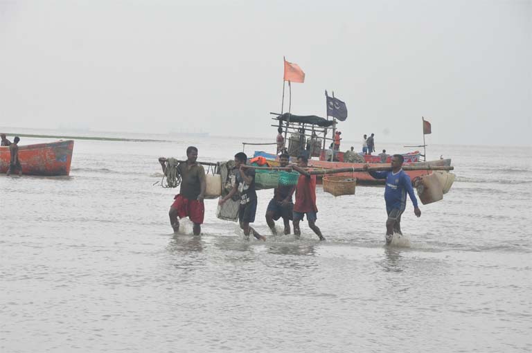 Fishermen are moving to safer place from Rashmoni Ghat as cyclone Bulbul approaching .This picture was taken yesterday.