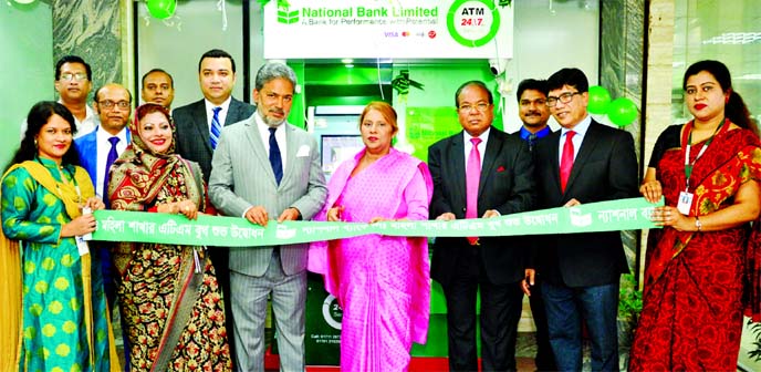 Lawmaker Parveen Haque Sikder inaugurating an ATM booth of the National Bank Ltd at the newly inaugurated NBL Mohila Branch at Sikder Real Estate at West Dhanmondi in the capital on Saturday.