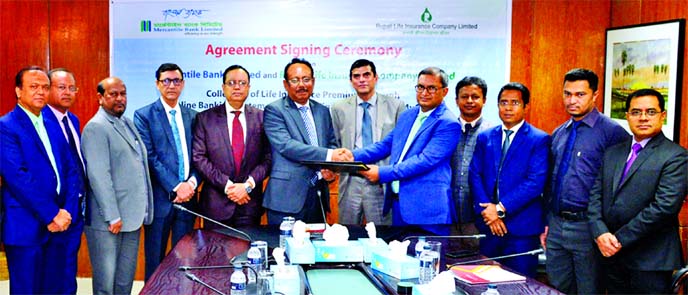 Adil Raihan, Deputy Managing Director of Mercantile Bank Limited and Md Golam Kibria, Managing Director and CEO of Rupali Life Insurance, exchanging document after signing an agreement the banks head office in the city recently. As per the deal, the bank