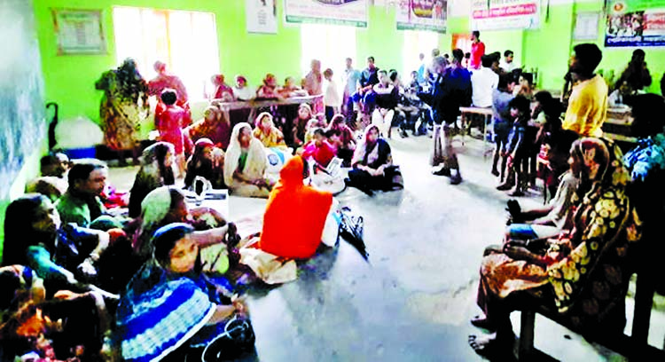 Evacuees take shelter in a relief center set up at Patuakhali Primary School in Barguna as a severe cyclonic storm is approaching Bangladesh's coastline.