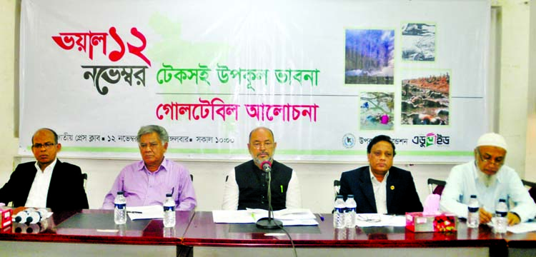 State Minister for Disaster Management and Relief Dr Enamur Rahman speaking at a discussion on 'Horrific November 12: Sustainable Thoughts for the Coast' organised by Upakul Foundation at the Jatiya Press Club on Tuesday.