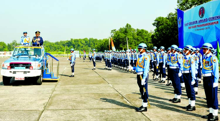 Chief of Air Staff Air Chief Marshal Masihuzzaman Serniabat reviewing parade on the occasion of BAF colour awarding to BAF Base Paharkanchanpur in Tangail on Wednesday. ISPR photo