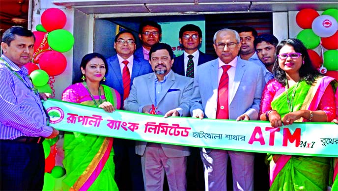 Md Obayed Ullah Al Masud, Managing Director of Rupali Bank Limited, inaugurating its refurnished ATM Booth of Hatkhola branch at the branch premises in the city on Wednesday. Senior officials of the bank and local elites were also present.