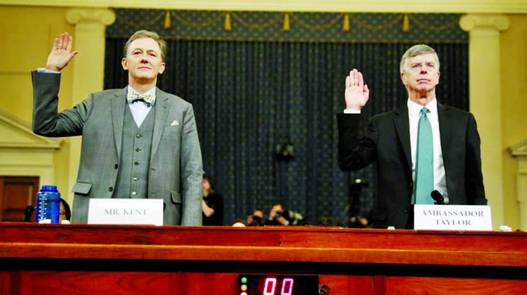 Career Foreign Service officer George Kent and top US diplomat in Ukraine William Taylor, right, are sworn in to testify during the first public impeachment hearing of the House Intelligence Committee on Capitol Hill in Washington. Internet photo