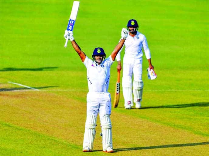 Mayank Agarwal (front) of India celebrating his double century against Bangladesh on the second day of the first Test match at Holkar Stadium in Indore, India on Friday.