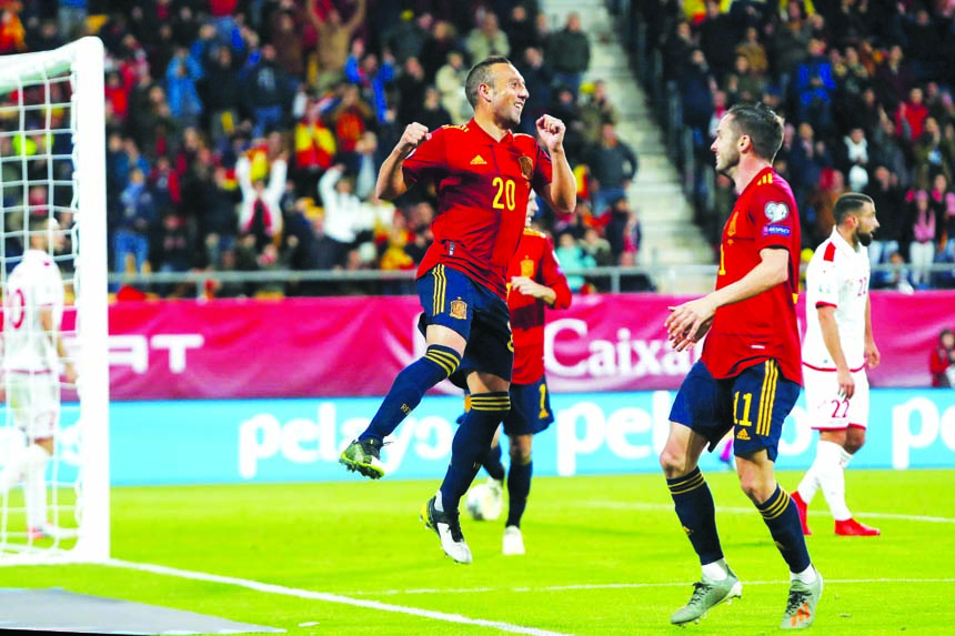 Spain's Santi Cazorla ( center) celebrates after scoring his side's second goal during a Euro 2020 Group F qualifying soccer match between Spain and Malta at the Ramon de Carranza stadium in Cadiz, Spain on Friday.