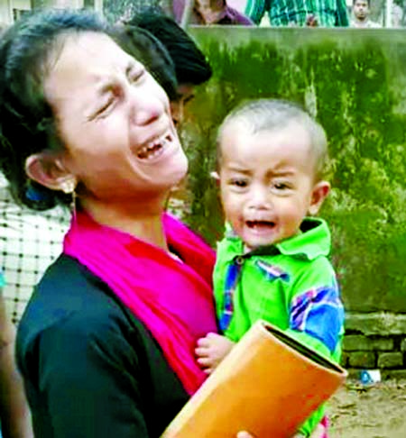 A victimâ€™s mother seen wailing after the blast.