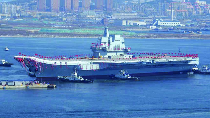 China confirmed on Monday that its first domestically built aircraft carrier had sailed through the Taiwan Strait for "routine"" training and tests after Taipei accused Beijing of intimidation around upcoming elections."