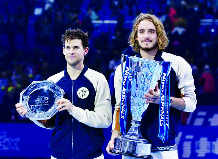 Stefanos Tsitsipas (right) of Greece poses with Dominic Thiem of Austria after the singles final at the Nitto ATP World Tour Finals 2019 in London, Britain on Sunday.