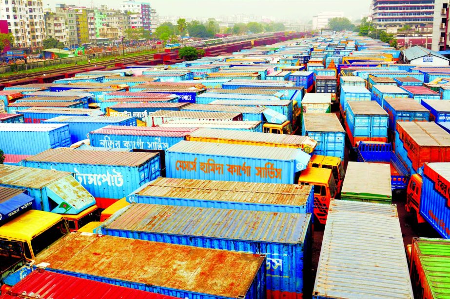 Thousands of trucks, covered vans remain parked and halted for an indefinite period from today (Wednesday), demanding reformation of new Road Transport Act (RTA) organised by Truck, Covered Van Owner-Worker Oikya Parishad. This photo was taken from Tejgao