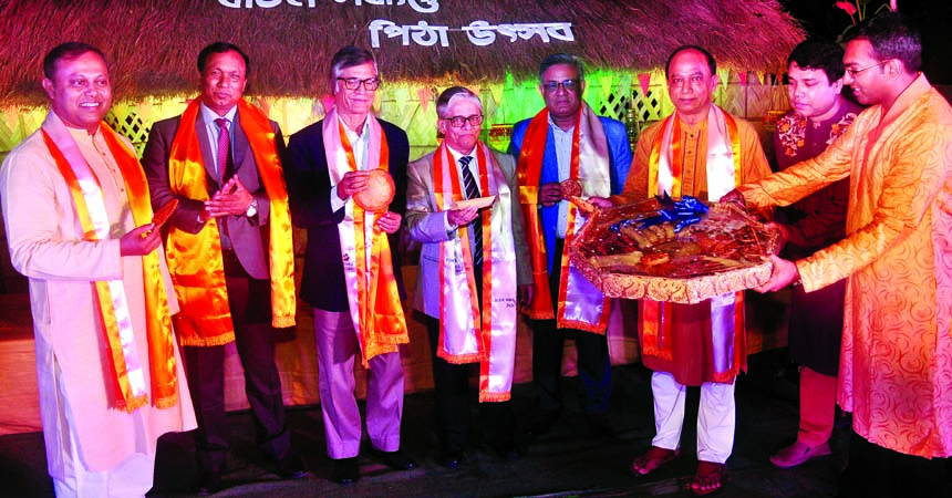 Vice-Chancellor of Dhaka University Prof. Dr. Mohammad Akhtaruzzaman, among others, at a cake festival organised by Dhaka University Club on its premises on Thursday. PRO, DU photo