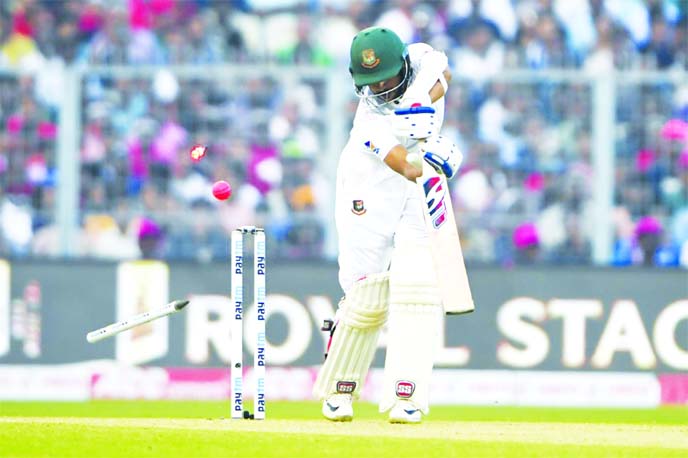 Bangladesh's Nayeem Hasan is clean bowled off India's Ishant Sharma during their first day of the second Test match of a two-match series at The Eden Gardens in Kolkata on Friday.