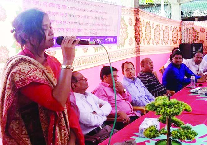 BHANGURA (Pabna): Azida Khatun Pakhi, Female Vice Chairman of Bhangura Upazila Parishad speaking at the biennial council of Bhangura Upazila Puja Observance Council at Kalibari Temple premises on Friday. Among others, Golam Hasnain Rashel , Mayor , Bhangu