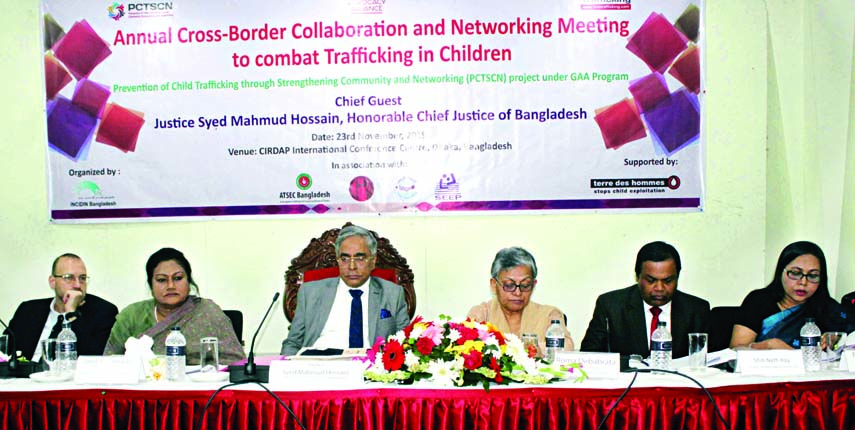 Chief Justice Syed Mahmud Hossain along with other distinguished persons at the Annual Cross Border Collaboration and Networking Meeting to Combat Trafficking in Children organised by Incidin Bangladesh in CIRDAP Auditorium in the city on Saturday.