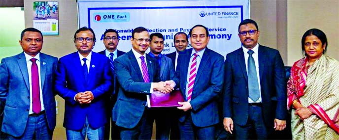 M Fakhrul Alam, Managing Director of ONE Bank Limited and Kaiser Tamiz Amin, Managing Director of United Finance Limited exchanging documents after signing an agreement at the bank's head office in the city on recently. Under the deal, the bank will prov