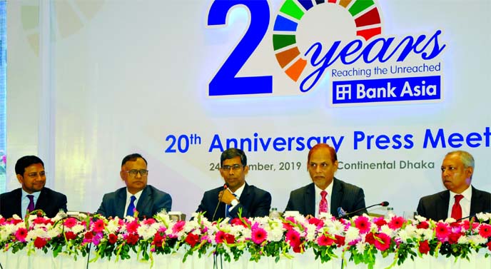 Md. Arfan Ali, Managing Director of Bank Asia Limited, addressing at a press conference marking its 20th anniversary at a hotel in the city on Sunday. Mohammad Borhan Uddin, Md. Sazzad Hossain, Md. Ziaul Hasan Mollah, DMDs, Safiuzzaman, Head of Corporate