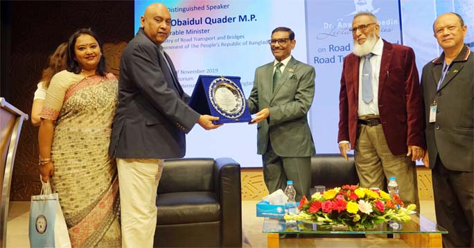 Nadia Anwar, Chairman of AIUB Board of Trustees presents a plaque of appreciation to Road Transport and Bridges Minister Obaidul Quader, MP after a lecture series on Road Act 2019 held at the city's American International University-Bangladesh recently.