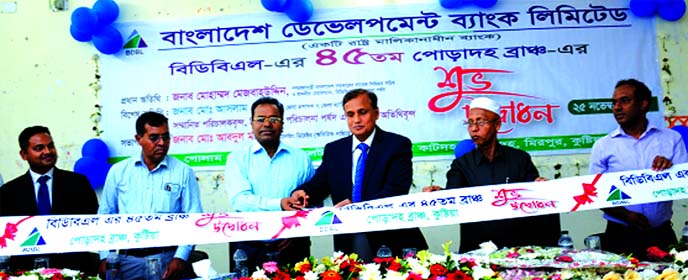 Mohammad Mejbahuddin, Chairman of Bangladesh Development Bank Limited (BDBL), inaugurating the bank's 45th Poradah Branch at Poradah in Kushtia on Monday. Managing Director (Additional Charge) Md. Abdul Matin, Kushtia Deputy Commissioner Md Aslam Hossain