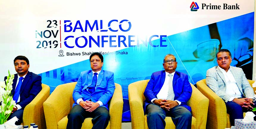 Md. Zakir Hossain Chowdhury, General Manager of Prime Bank, poses along with Deputy Director Md. Rokon-Uz-Zaman and Deputy Managing Director Md. Golam Rabbani after attending a BAMLCO Conference at Bishwa Shahitto Kendro Auditorium in Dhaka recently for i