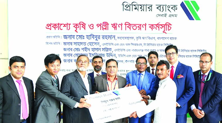 Md Habibur Rahman, General Manager of Agriculture Credit Department of Bangladesh Bank, distributing agri-loan among the clients of Premier Bank Limited at Bashgari Branch at Bhairab in Kishoregonj recently. Sahadat Hossain, SEVP and Head of CRM, Md. Sha