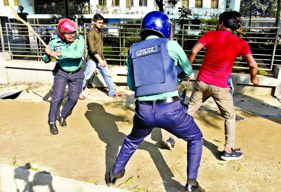 Police charged batons on demonstrators near High Court on Tuesday.