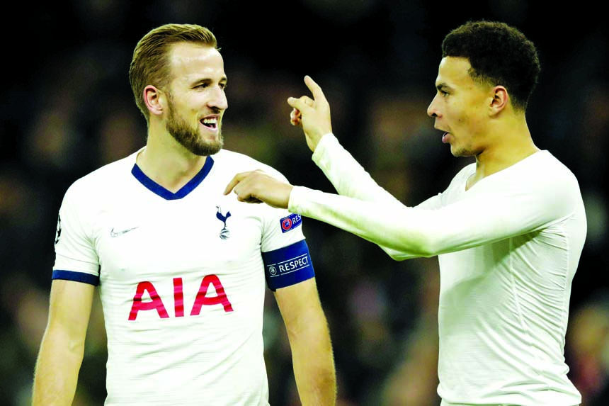 Tottenham's Harry Kane (left) celebrates with Tottenham's Dele Alli after the Champions League Group B soccer match between Tottenham Hotspur and Olympiakos at the Tottenham Hotspur Stadium in London on Tuesday.
