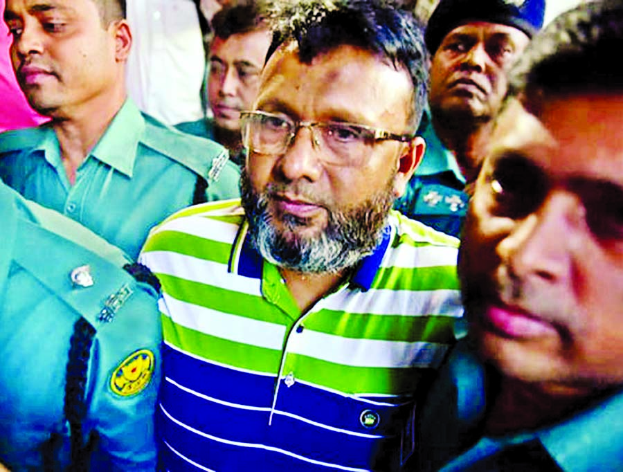 Police escort former Officer-in-Charge of Sonagazi Police Station Moazzem Hossain to the Cyber Tribunal of Dhaka on Thursday.
