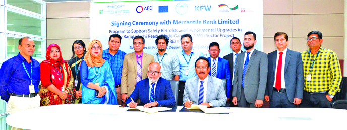 Md Quamrul Islam Chowdhury, Managing Director & CEO of Mercantile Bank Limited and Md Abdul Mannan, General Manager & Project Director of SREUP of Bangladesh Bank (BB), signing agreement to Support of Safety Retrofits and Environmental Upgrades in the Ban