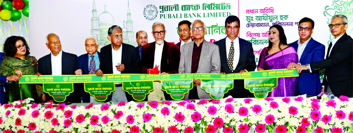 M. Azizul Huq, Chairman of Board of Directors of Pubali Bank Ltd, inaugurating its Islamic Banking Window at Gulshan Corporate branch in Dhaka recently. Bangladesh Red Crescent Society Chairman Hafiz Ahmed Mazumder MP, bank's Directors Monzurur Rahman, M