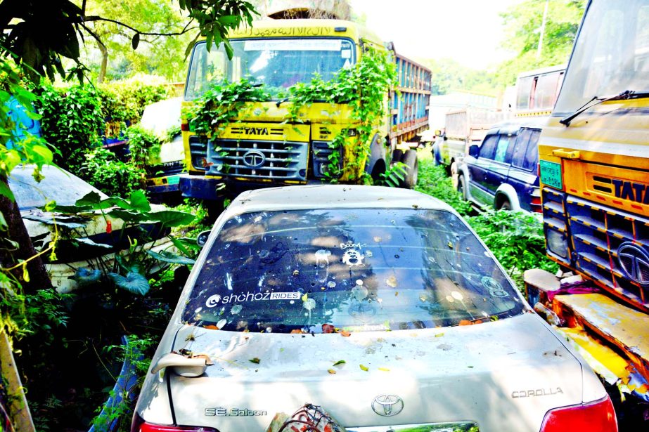 DMP traffic division dumps vehicles without fitness and valid documents at Shahbagh in the city as the division has no specific place for dumping such seized vehicles. The photo was taken on Friday.