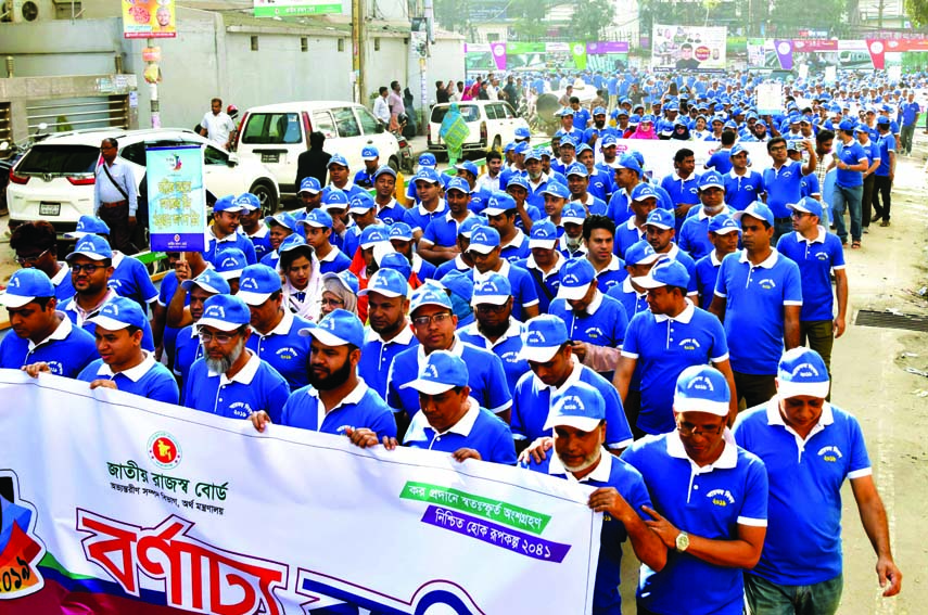 National Board of Revenue brought out a rally in the city's Segunbagicha on Saturday marking National Income Tax Day-2019.