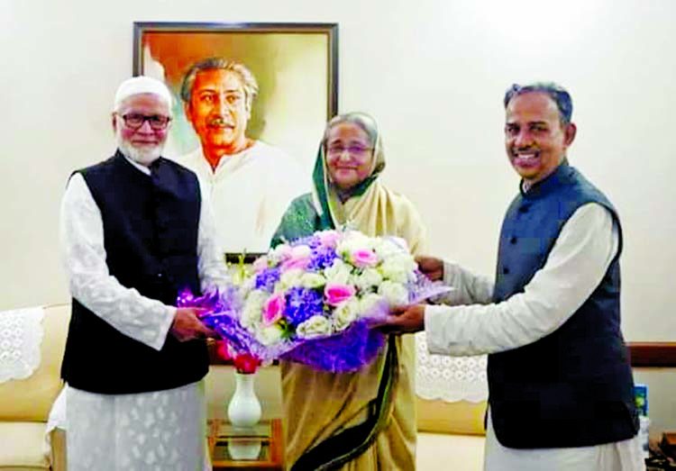 Newly-elected President and General Secretary of Bangladesh Awami League, Dhaka South City Unit veteran freedom fighter Alhaj Abu Ahmed Mannafi and Humayun Kabir respectively greeting Prime Minister and President of Bangladesh Awami League Sheikh Hasina