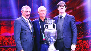 (From left) Portugal coach Fernando Santos, France coach Didier Deschamps and Germany coach Joachim Loew pose with the trophy after being drawn in group F in the Euro 2020 Finals Draw in Bucharest, Romania on Saturday.