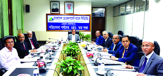 Mohammad Mejbah Uddin, Chairman, Board of Directors of Bangladesh Development Bank Limited (BDBL), presiding over its 241st meeting at its head office in the city recently. Kazi Alamgir, CEO along with directors Md. Abu Hanif Khan, Kazi Tariqul Islam, Sub