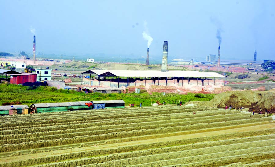 Brick kilns are in operation in Keraniganj, on the outskirts of capital Dhaka, violating environmental rules. This photo was taken on Monday shows that thick toxic fumes produced by those brick kilns continue to pollute air driving climate change and harm