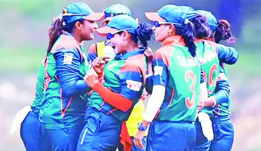 Members of Bangladesh Women's Cricket team celebrate after defeating their counterpart Sri Lanka National Women's Cricket team at the Cricket Competition in 13th South Asian Games at Pokhara in Nepal on Tuesday.
