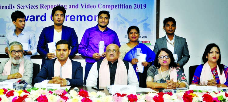 State Minister for Information Dr. Murad Hasan, among others, at a ceremony organised on the occasion of 'Youth Friendly Services Reporting and Video Competition-2019' by SERAC Bangladesh at the Jatiya Press Club on Tuesday.