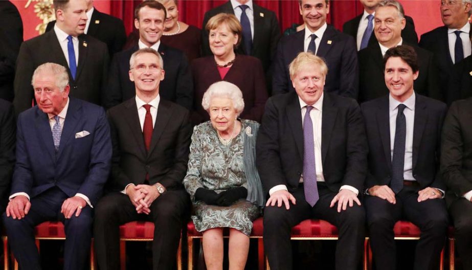 Front row (L-R) BritainÂ´s Prince Charles, Prince of Wales, NATO Secretary General Jens Stoltenberg, BritainÂ´s Queen Elizabeth II, BritainÂ´s Prime Minister Boris Johnson and CanadaÂ´s Prime Minister Justin Trudeau sit together at Buckingham Pala