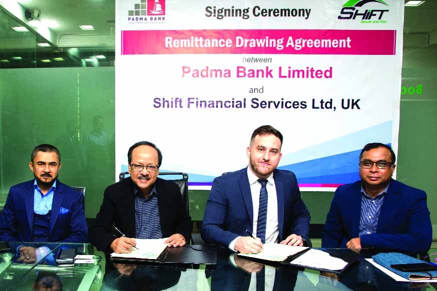 Md Ehsan Khasru, Managing Director and CEO of Padma Bank and Mohammad Fouzie Mahrat, Director of Shift Financial Services Limited, signing an agreement at the bank's corporate office in the city recently. Under the deal, Bangladeshi migrants in Middle Ea
