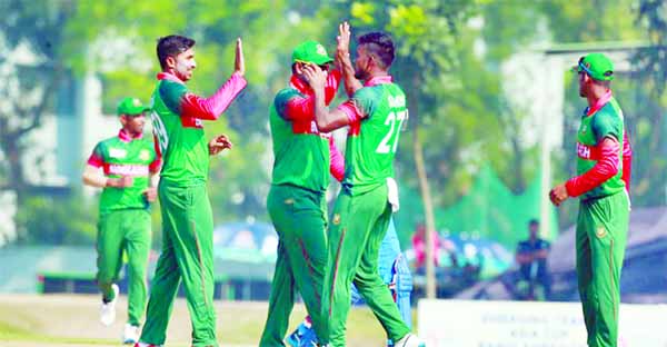 Players of Bangladesh cricket team celebrate after dismissal of a wicket of Bhutan cricket team during their cricket match of the 13th South Asian Games (SAG) in Nepal on Friday.