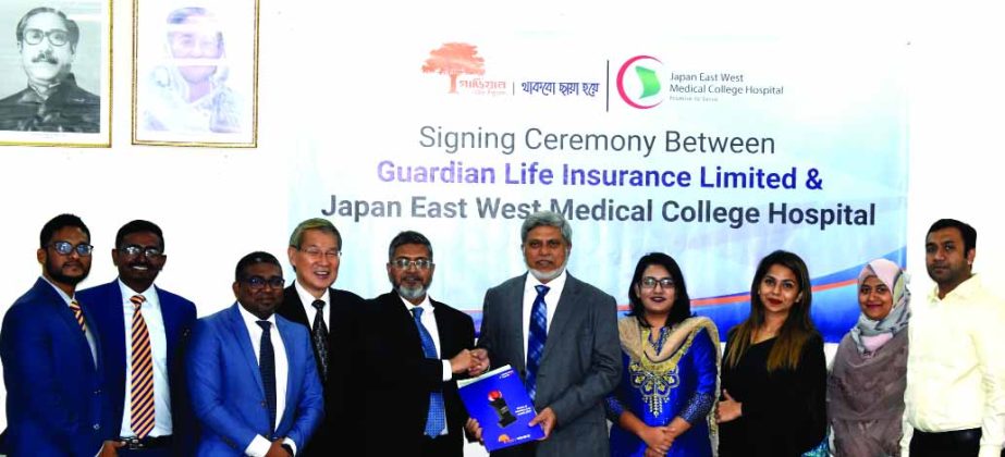 M M Monirul Alam, CEO of Guardian Life Insurance Limited (GLIL) and Dr. Md. Moazzem Hossain, Managing Director of Japan East West Medical College, exchanging an agreement signing document at GLIL head office in the city recently. Under the deal, around 28