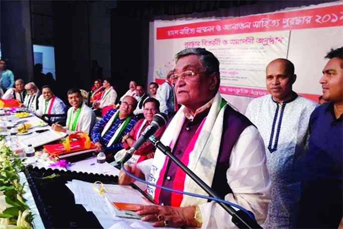 Engineer Khandker Mosharraf Hossain MP , Awami League Advisory Council Member and Chairman of the Parliamentary Standing Committee on Ministry of LGRD and Cooperatives speaking at the MohaKobi Alaol Literary Award giving ceremony organised by Faridpu