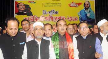 Newly- elected President MA Salam (Second from right) and General Secretary Ataur Rahman Ata (Second from left) of the Chattogram North District Awami League.