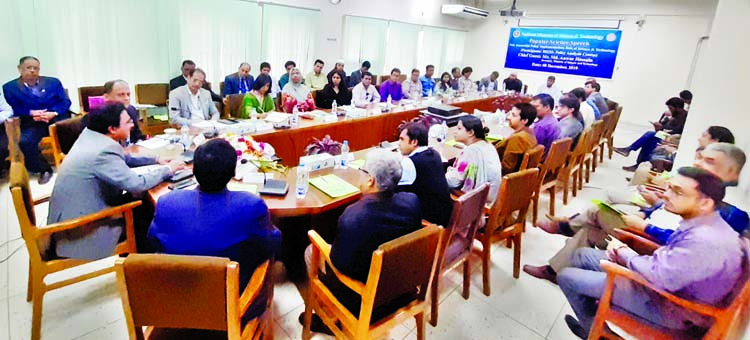 Md Anwar Hossain, Secretary, Ministry of Science and Technology speaking at a science lecture on ' Successful Policy Implementation : Role of Science and Technology' at National Science and Technology Museum, Agargaon in the city yesterday .