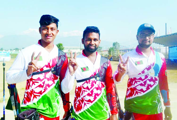 Bangladesh men's archery team showing victory sign after securing gold medal in the men's recurve team event at Pokhara Stadium in Nepal on Sunday. BOA photo