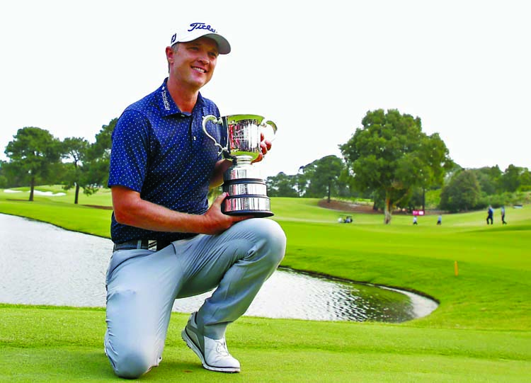 Matt Jones of Australia poses with the Stonehaven Cup after winning The Australian Open Golf Championship at The Australian Golf Club in Sydney on Sunday.