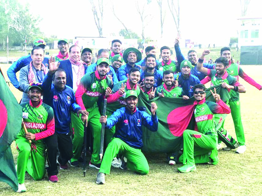 Members of Bangladesh Cricket team celebrating after earning the gold medal beating their counterpart Sri Lanka in the final of the Cricket Competition of 13th South Asian Games in Nepal on Monday.