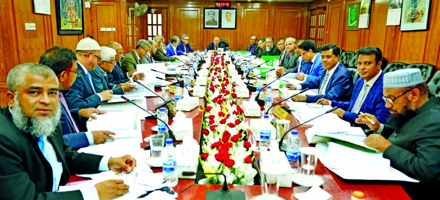 Professor Md. Nazmul Hassan, Chairman of Islami Bank Bangladesh Limited, presiding over its meeting at the bank's head office in the city on Tuesday. Md. Shahabuddin, Vice-Chairman, Md. Mahbub ul Alam, CEO and directors of the bank Jwere also present.