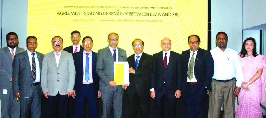 Ali Reza Iftekhar, CEO of Eastern Bank Limited (EBL) and Md. Shoab, General Manager (Admin and Finance) of Bangladesh Economic Zones Authority (BEZA), exchanging documents after signing an agreement on opening an EBL branch at Bangabandhu Sheikh Mujib Sh