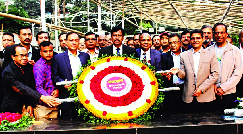 Newly appointed Chief Engineer of Local Government Engineering Department (LGED) Md Rezaul Karim along with other high officials placing wreaths at the portrait of Bangabandhu Sheikh Mujibur Rahman in the city's 32, Dhanmondi yesterday.